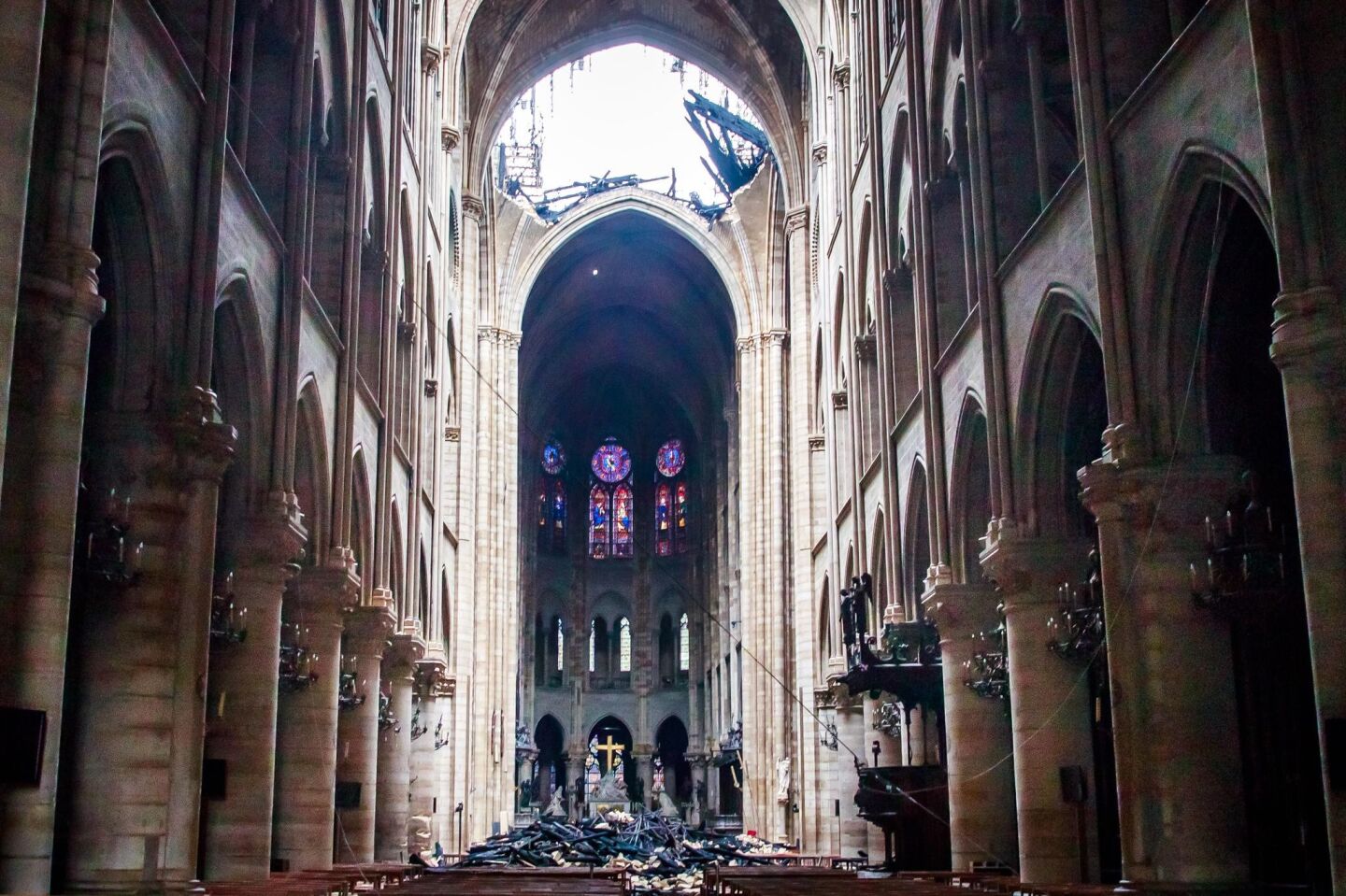 View of damage to Notre Dame Cathedral following a fire that devastated the landmark in Paris. The famed stained-glass windows in the cathedral survived the blaze.