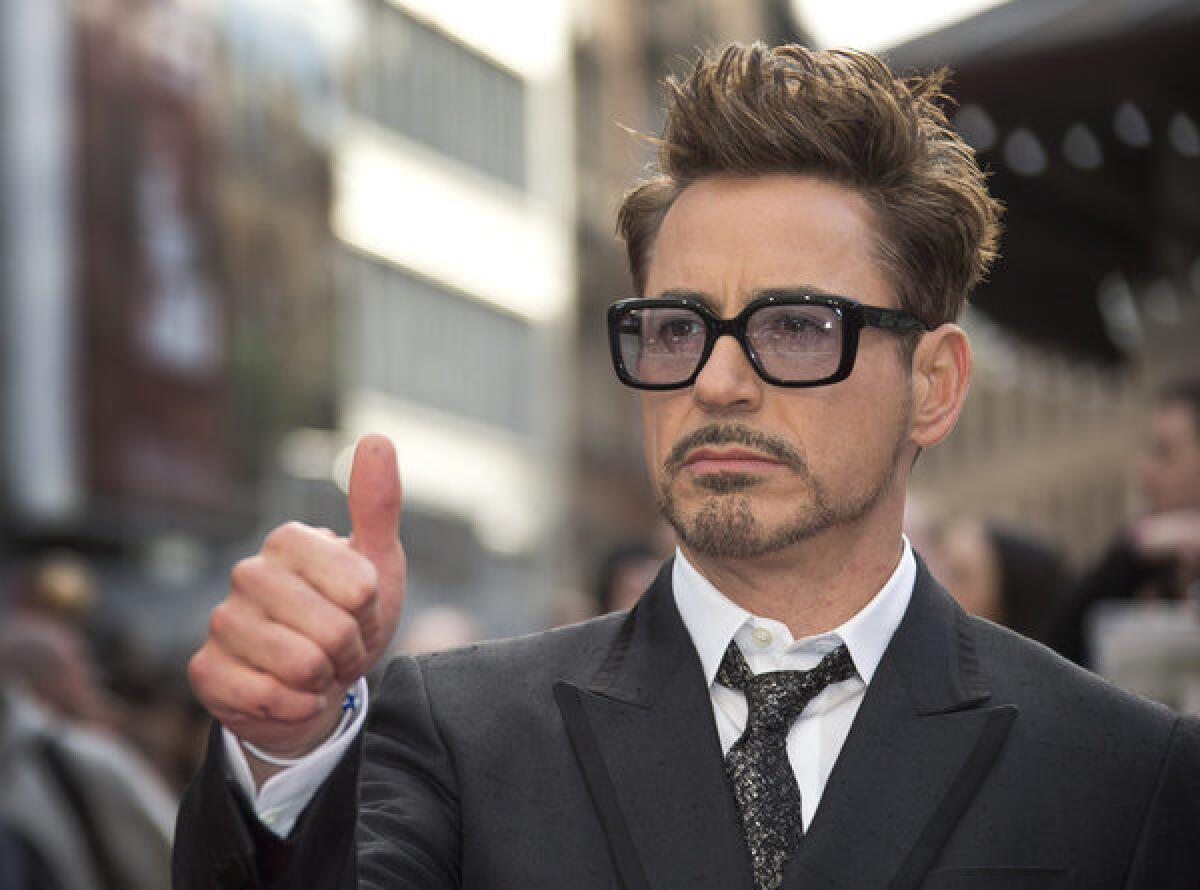 Actor Robert Downey Jr. has been signed by HTC to market its smartphones.