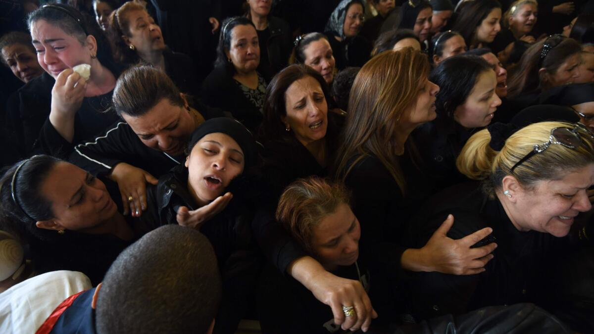 Egyptian women mourn for the victims of a bombing at St. Mark’s Cathedral in the coastal city of Alexandria.