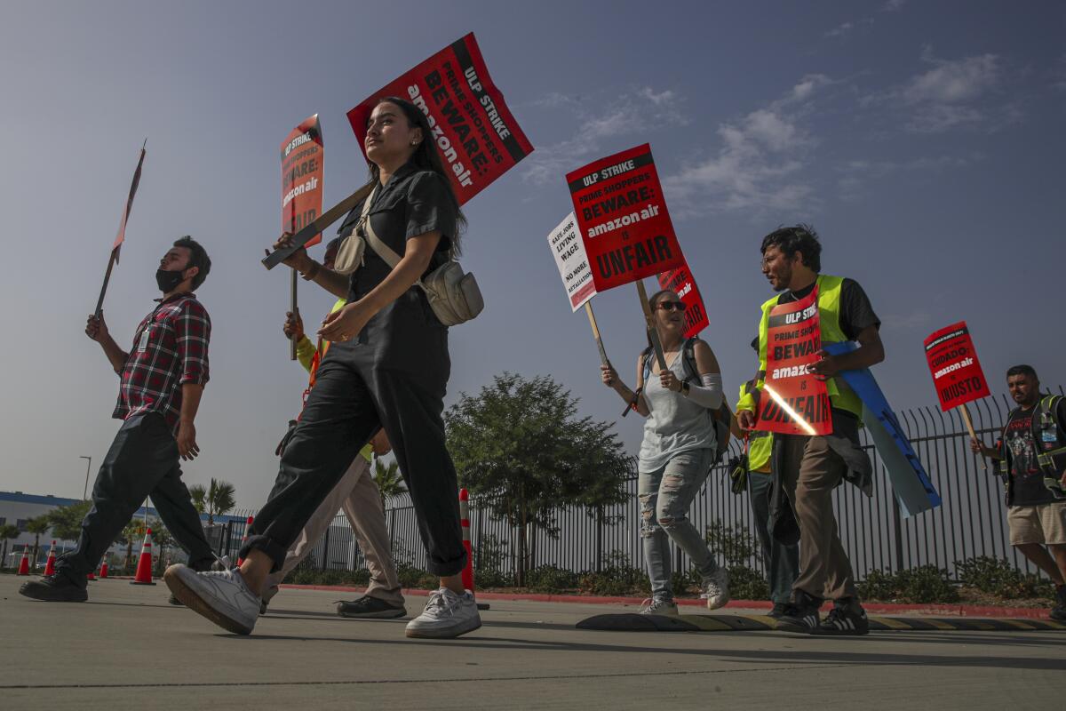 Amazon warehouse workers and members of Teamsters Union protest in San Bernardino, CA.