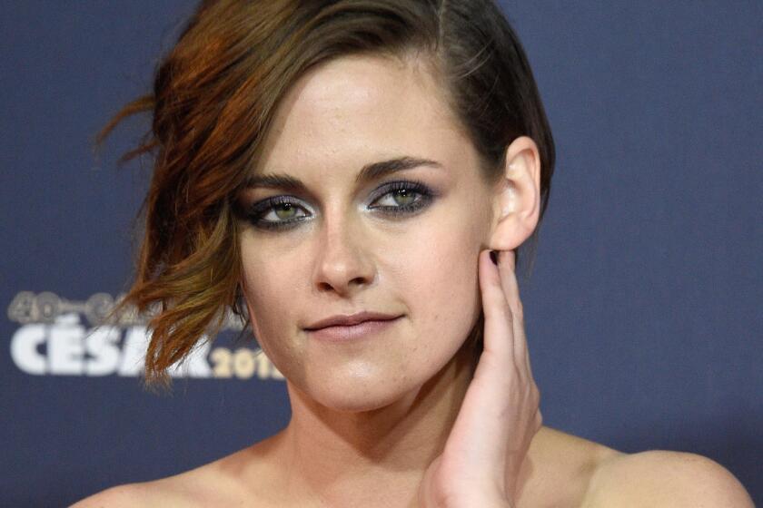 Kristen Stewart is dating her personal assistant, the actress' mom has confirmed to a British newspaper.