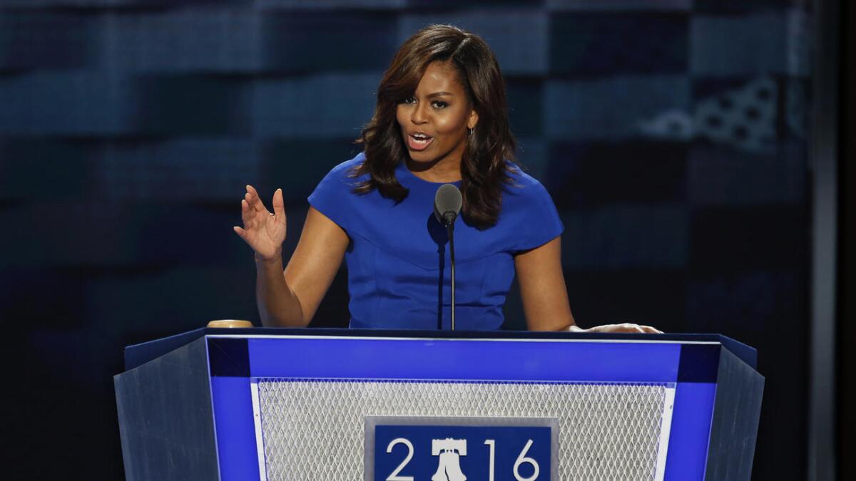 First Lady Michelle Obama addresses the crowd on the first night of the Democratic National Convention.