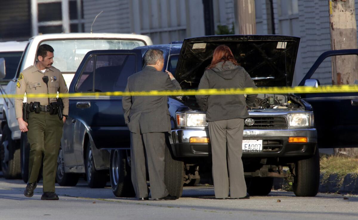 Los Angeles County sheriff's homicide detectives investigate a fatal shooting in the 4800 block of East Telegraph Road in East Los Angeles, where a adult male was found shot to death in a black SUV.