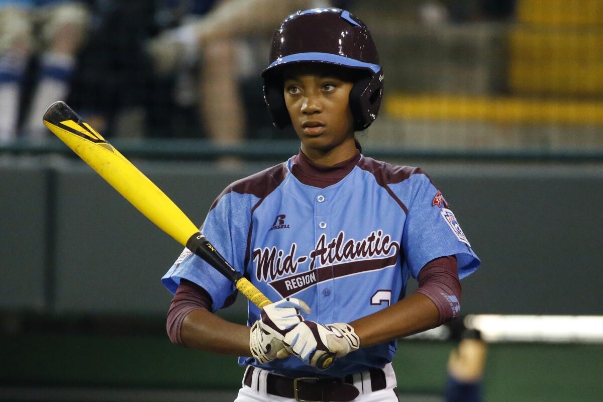 Philadelphia pitcher Mo'ne Davis looks for a sign during the fourth inning of a semifinal game against Las Vegas during the Little League College World Series on Aug. 20.