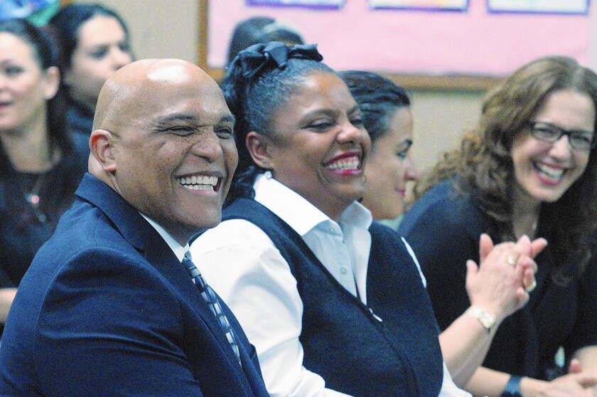 New Glendale Unified Superintendent Winfred Roberson Jr. and his wife Yvette are all smiles during the GUSD school board meeting Tuesday, Feb. 16, 2016. Roberson was hired to fill the vacancy left by Dick Sheehan, who was hired as superintendent of Covina-Valley Unified in May.