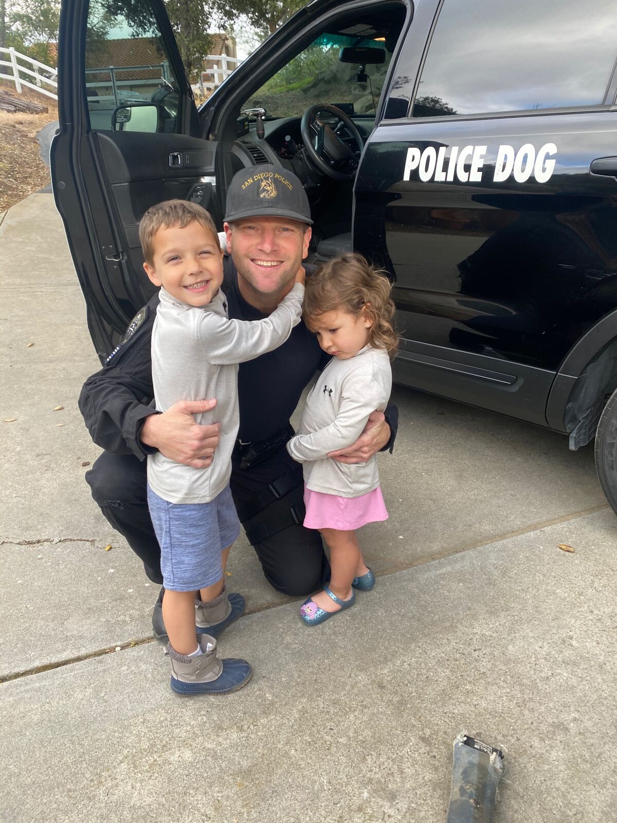 San Diego police Officer Jonathan Wiese with his two children.