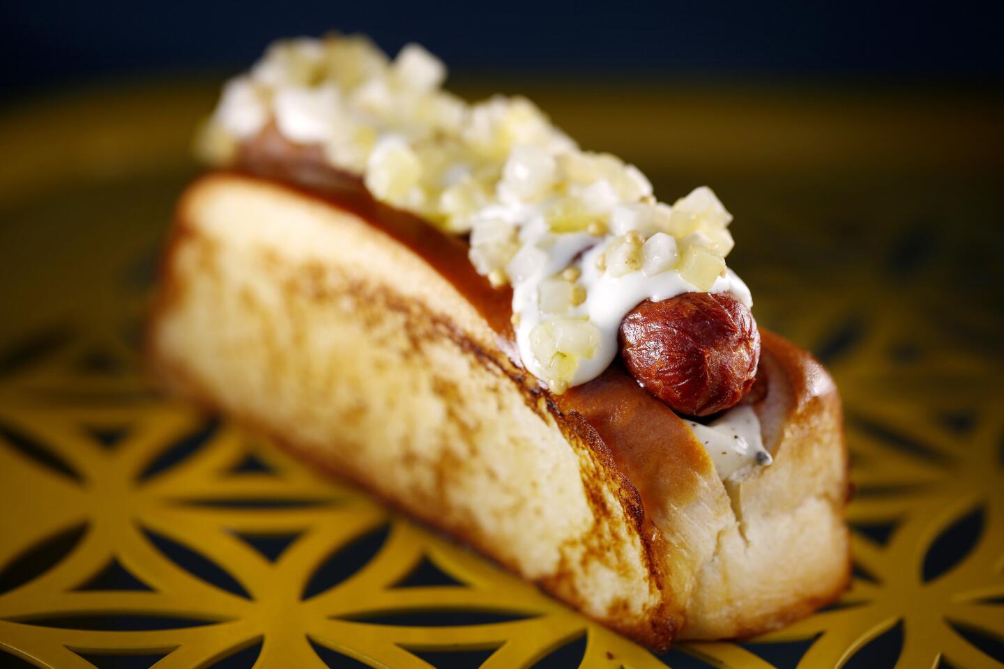 Chef Daniel Humm of the NoMad in New York is plying Los Angeles with luxury versions of casual food. Available at the NoMad food truck is the Humm dog, which is wrapped in bacon and served with black truffle mayonnaise and celery relish.