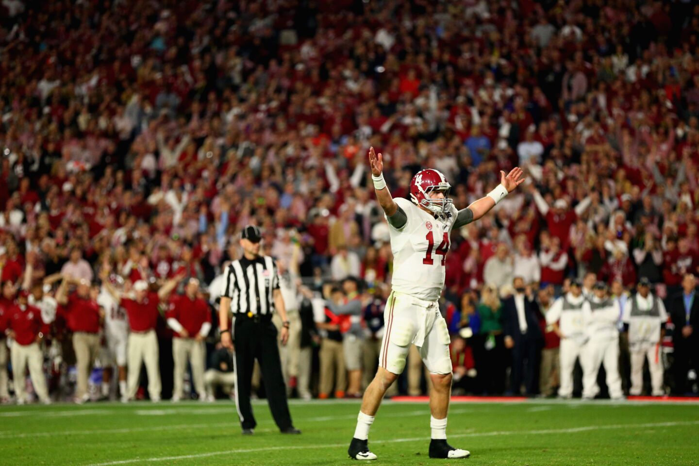 Alabama quarterback Jake Coker celebrates after Derrick Henry's touchodwn in the final minute of the fourth quarter.