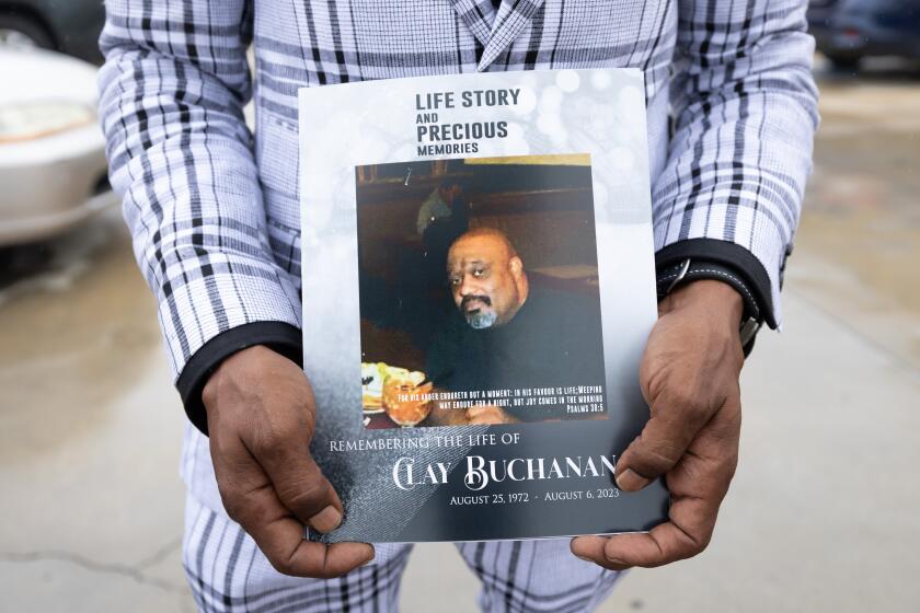 full business plan for a company LOS ANGELES, CA - SEPTEMBER 02: Christopher C. Buchanan holds a funeral service program for his older brother Clay Buchanan at True Everfaithful Baptist Church in Los Angeles, CA on Saturday, Sept. 2, 2023. Clay Buchanan, 50, was killed in August when someone set his vehicle on fire while he slept in South L.A. (Myung J. Chun / Los Angeles Times)
