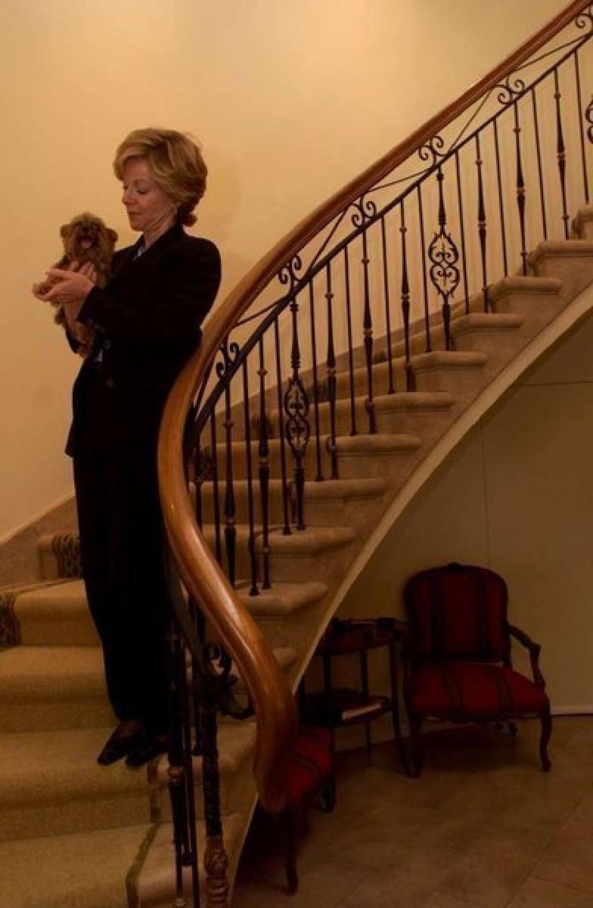 Philanthropist Nancy Daly and her dog, Molly.