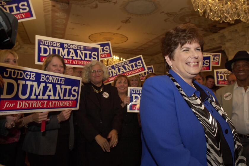  Judge Bonnie Dumanis is all grins with her supporters in her 2002 election night headquarters at the US Grant Hotel