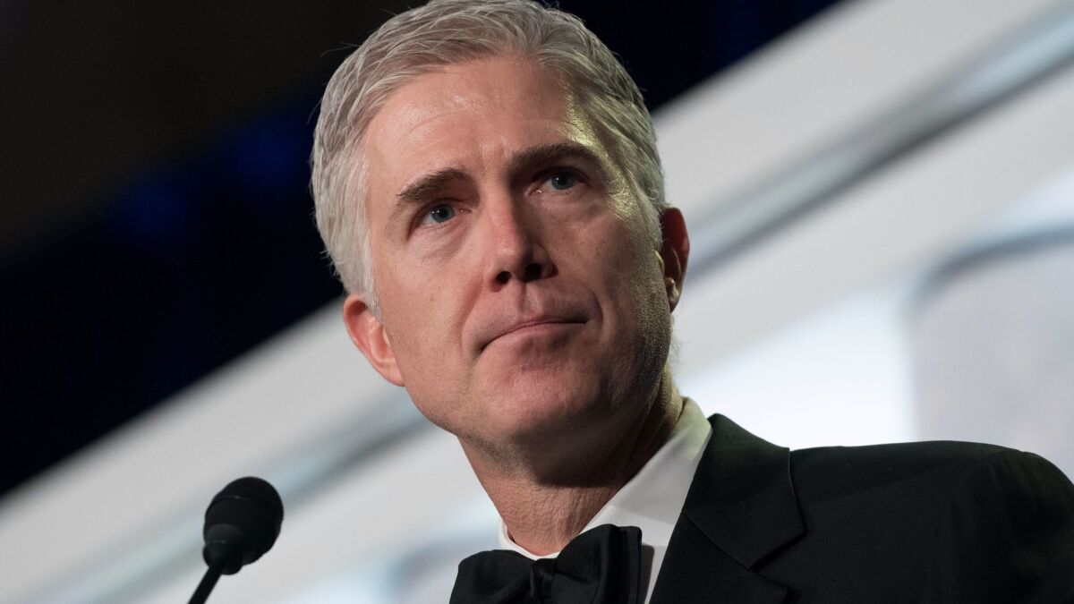 Supreme Court Justice Neil M. Gorsuch speaks at the Federalist Society's 2017 National Lawyers Convention in Washington on Nov. 16.