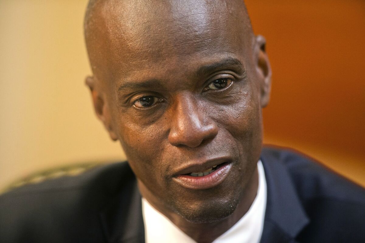 FILE - Haiti's President Jovenel Moise speaks during an interview at his home in Petion-Ville, a suburb of Port-au-Prince, Haiti, Feb. 7, 2020. Authorities in the Dominican Republic on Wednesday, March 2, 2022, have handed over to Haiti a former Haitian police officer linked to the assassination of President Jovenel Moïse, the latest suspect arrested in a crime still not solved after seven months. (AP Photo/Dieu Nalio Chery, File)