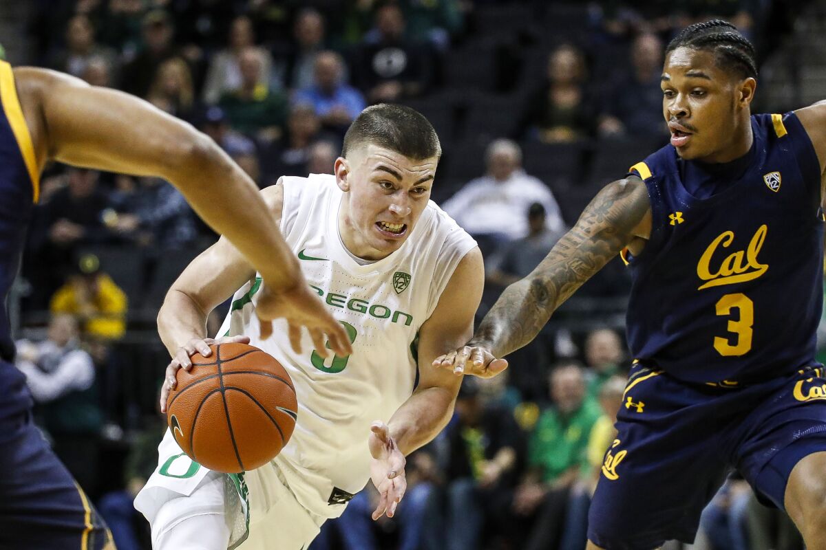 Oregon guard Payton Pritchard drvies to the basket against California during a game March 5, 2020, in Eugene, Ore.