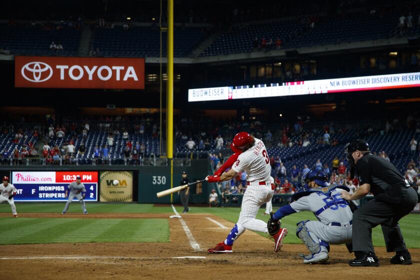 Philadelphia Phillies' Bryce Harper hits the game-winning two-run double off Los Angeles Dodgers relief pitcher Kenley Jansen during the ninth inning of a baseball game Tuesday, July 16, 2019, in Philadelphia. Philadelphia won 9-8. (AP Photo/Matt Slocum)