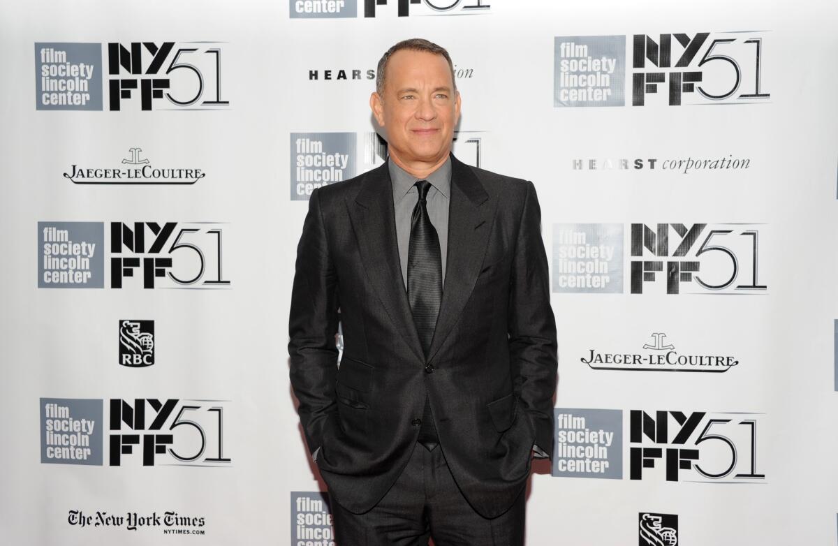 Actor Tom Hanks attends the world premiere of "Captain Phillips" during the opening night of the 51st New York Film Festival on Friday, Sept. 27, 2013, in New York.