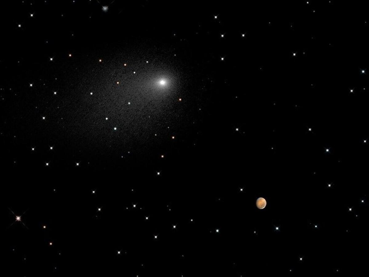 This composite image shows the relative positions of Mars and comet Siding Spring during its flyby on Sunday.