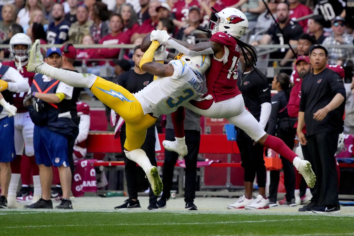 Chargers safety Derwin James Jr. (3) intercepts a ball intended for Arizona Cardinals wide receiver Pharoh Cooper.