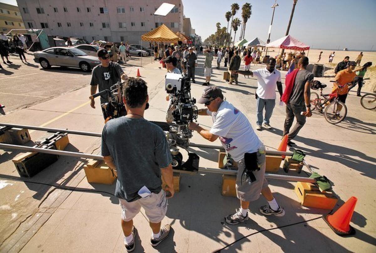 A crew films a scene for "NCIS: Los Angeles" in Venice.