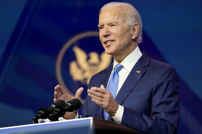 President-elect Joe Biden announces his choice for several positions in his administration during an event at The Queen theater in Wilmington, Del., Friday, Dec. 11, 2020. (AP Photo/Susan Walsh)