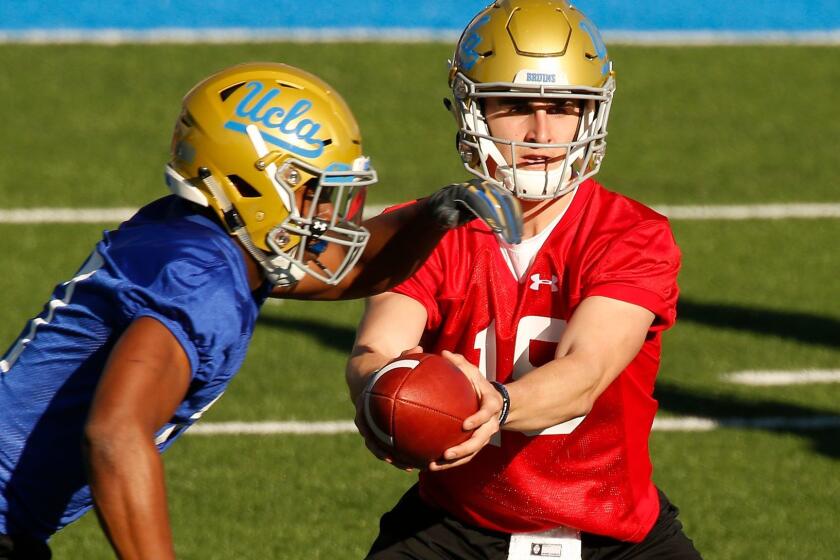 WESTWOOD, CA - MARCH 06, 2018 - UCLA quarterback Matt Lynch #15 works on the Spaulding practice field on the UCLA Westwood campus Tuesday morning March 6, 2018 for the start of Spring football. (Al Seib / Los Angeles Times)