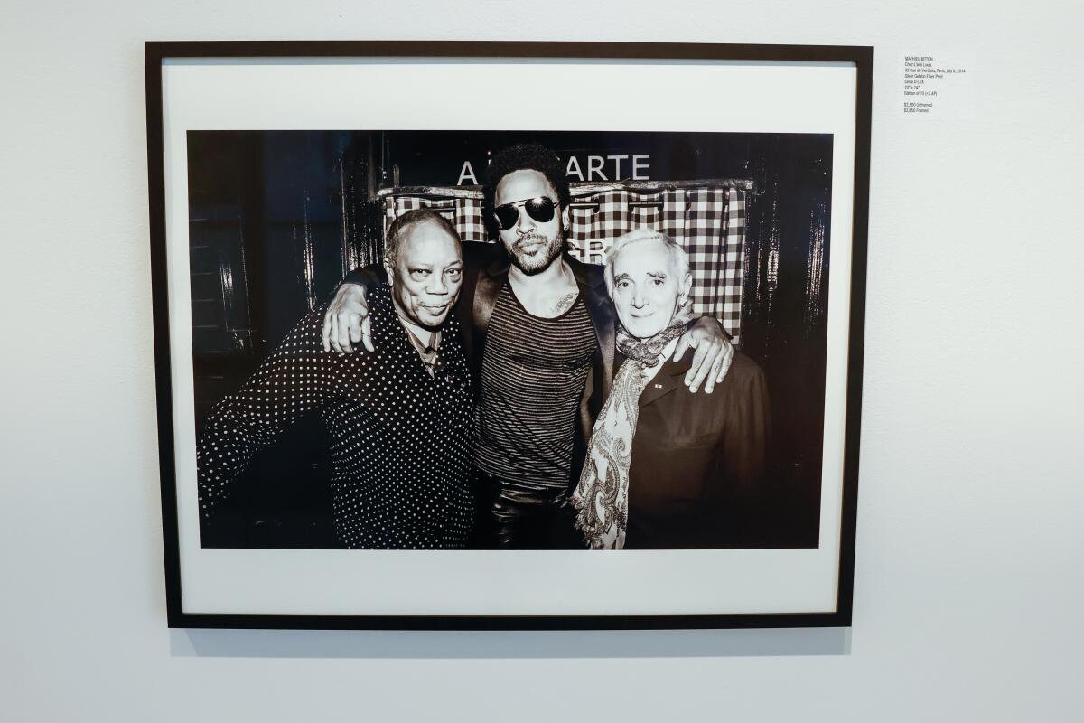 Black-and-white photo of Quincy Jones, Lenny Kravitz and Charles Aznavour