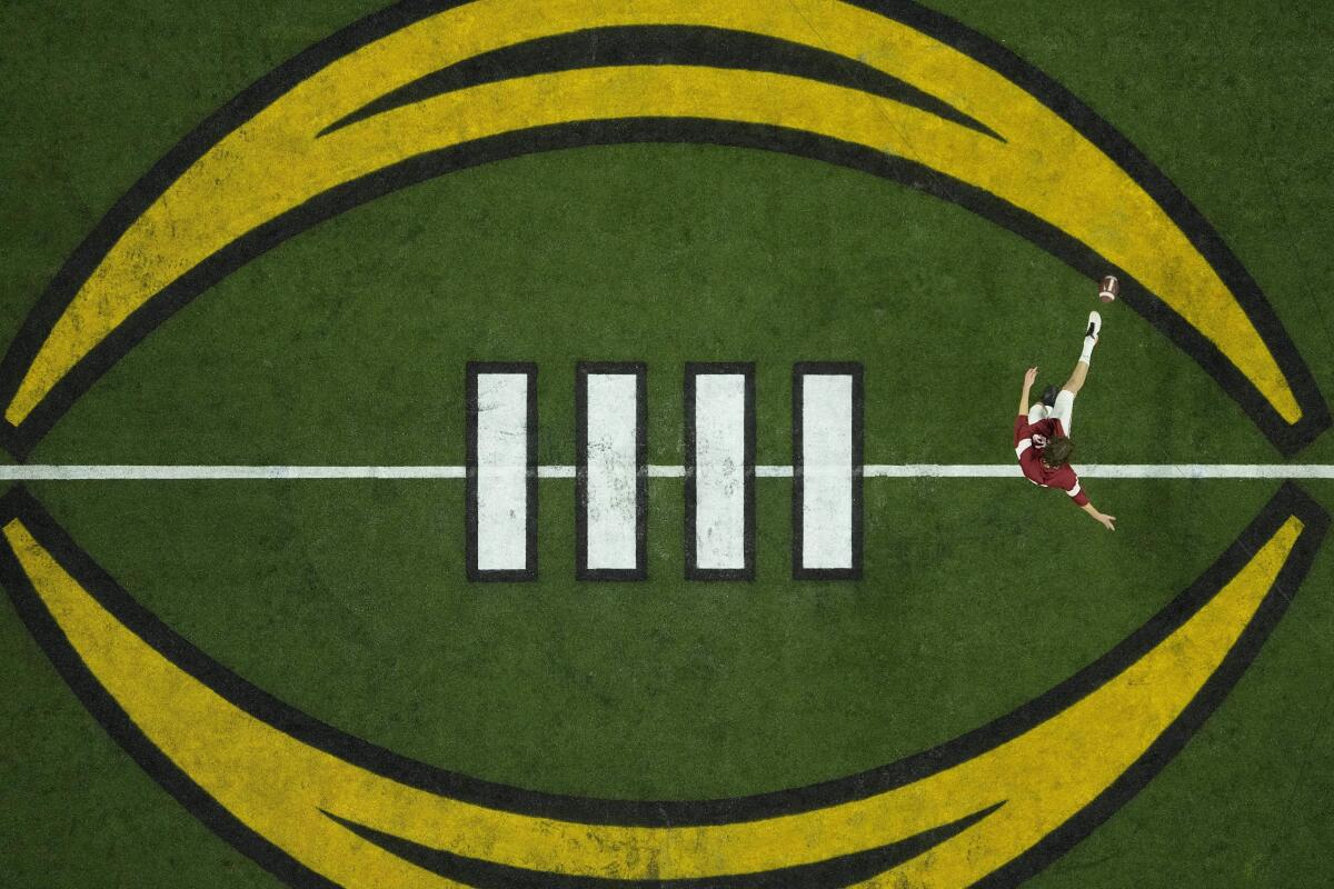 An overhead shot of Alabama's James Burnip warming up before the College Football Playoff championship game