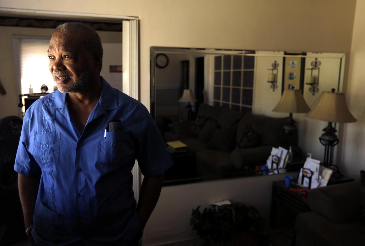 Former Motown singer-songwriter Larry Buford in the living room of his home.