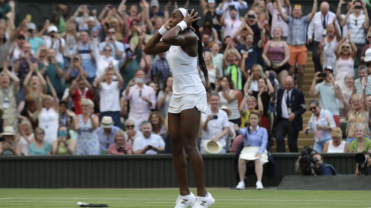 Coco Gauff, of Delray Beach, Fla., reacts after her 3-6, 7-6 (7), 7-5 third-round victory over Slovenia’s Polona Hercog on Friday at Wimbledon.