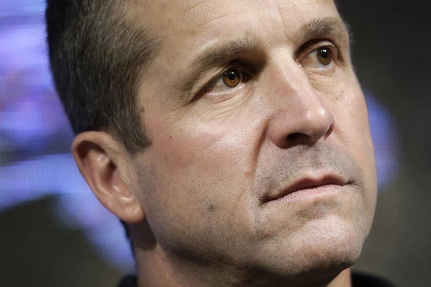 Baltimore Ravens head coach John Harbaugh speaks at an NFL football news conference Jan. 13.
