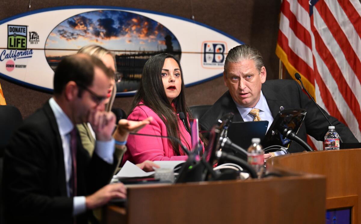 Mayor Gracey Van Der Mark and Councilmember Tony Strickland at a Huntington Beach City Council meeting.  