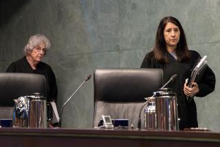 LOS ANGELES, CA - DECEMBER 05: Justice Carol A. Corrigan, left, and Chief Justice Patricia Guerrero at California Supreme Court's session in Los Angeles first time since before pandemic, in North Tower of Ronald Reagan State Office Building on Tuesday, Dec. 5, 2023 in Los Angeles, CA. (Irfan Khan / Los Angeles Times)