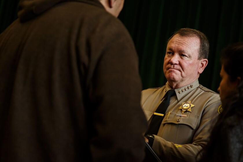 LOS ANGELES, CALIF. -- THURSDAY, JANUARY 26, 2017: L.A. County Sheriff Jim McDonnell greets attendees at the first-ever meeting of the L.A. County Sheriff Civilian Oversight Commission held at Bob Hope Patriotic Hall in Los Angeles, Calif., on Jan. 26, 2017. (Marcus Yam / Los Angeles Times)