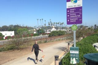 Encinitas re-opened its Coastal Rail Trail Friday morning after a week-long shut-down because people failed to follow social-distancing guidelines.