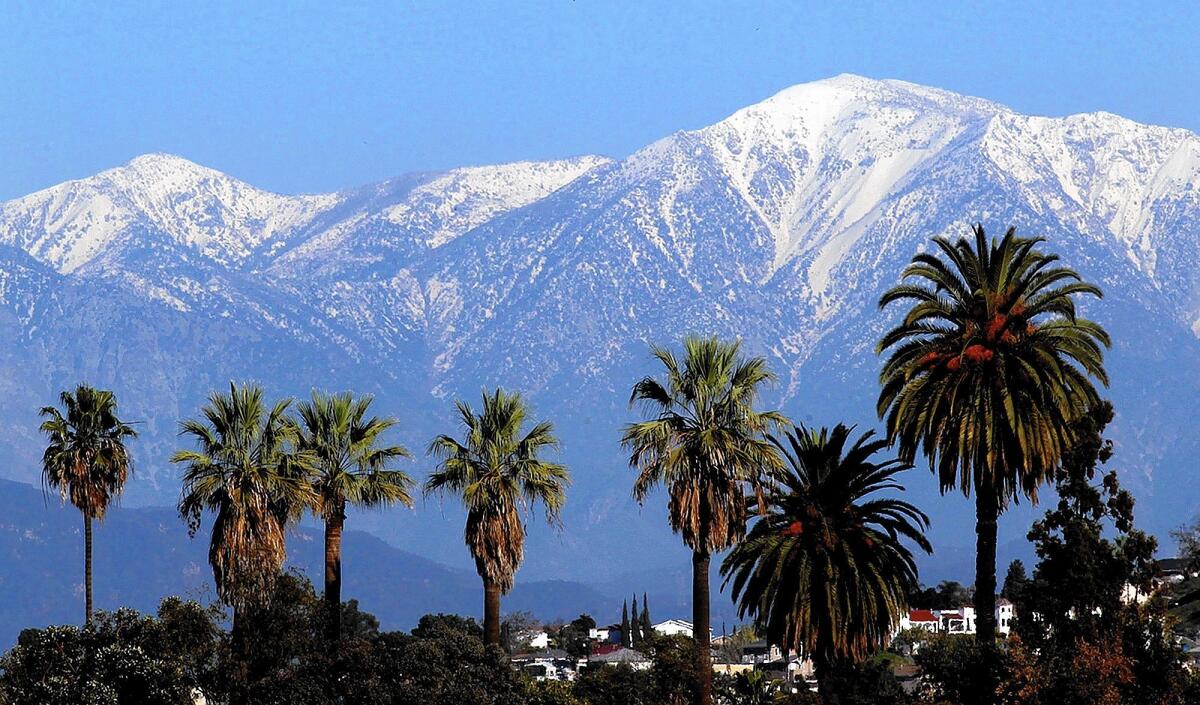 The snow-covered San Gabriel Mountains are seen from Boyle Heights in 2012.