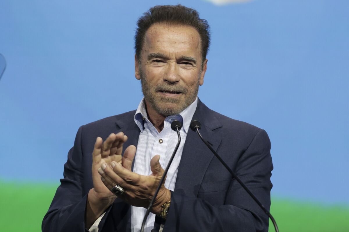 FILE - Arnold Schwarzenegger, founder of the "Austrian World Summit", talks about his dreams and actions to fight the climate crisis in Vienna, Austria, on July 1, 2021. The film icon told Russians in a video posted on social media they’re being lied to about the war in Ukraine and accused President Vladimir Putin of sacrificing Russian soldiers’ lives for his own ambitions. Schwarzenegger (AP Photo/Lisa Leutner, File)