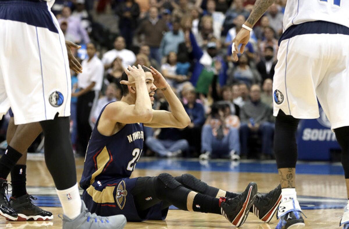 Pelicans guard Austin Rivers reacts after attempting a game-tying three-point shot against the Mavericks on Saturday night. No foul was called, although the NBA said Sunday one should have been.