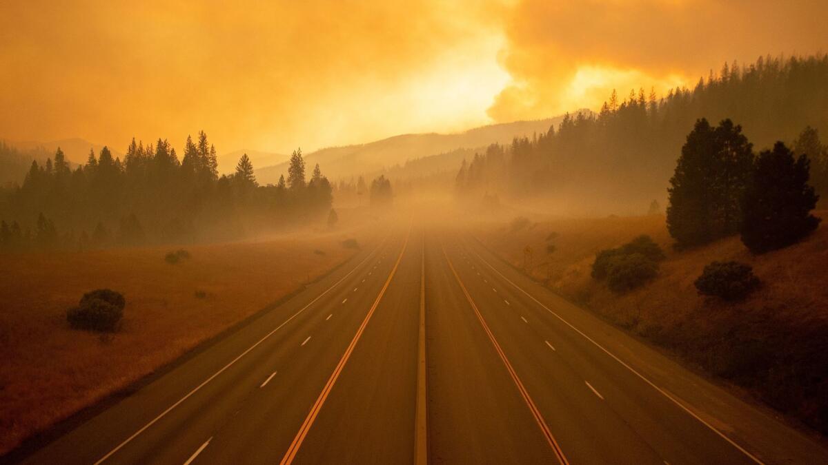 An empty stretch of Interstate 5 in Lamoine, Calif. The freeway has been closed for days because of the Delta fire in Shasta-Trinity National Forest.