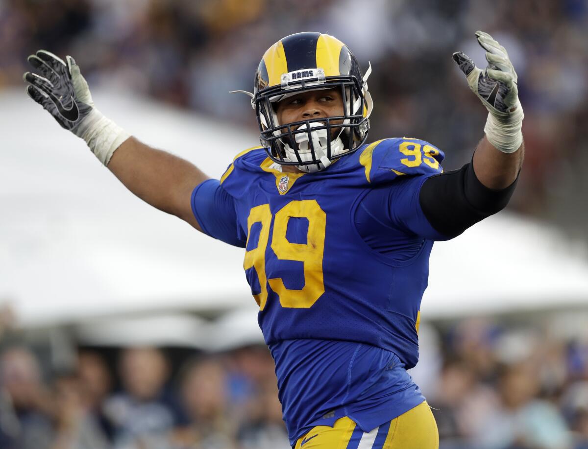 FILRams defensive end Aaron Donald celebrates a fumble recovery against the Seattle Seahawks.