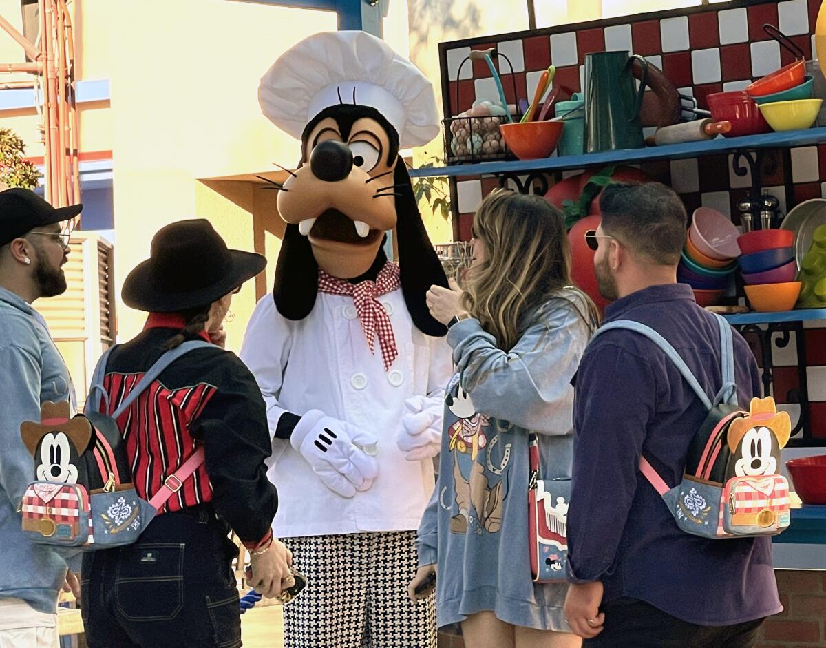 Chef Goofy visits with attendees of the Disney California Adventure Food & Wine Festival. 