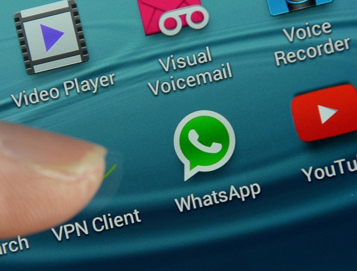 Logo of WhatsApp, the popular messaging service bought by Facebook for $19 billion, seen on a smartphone in New York.