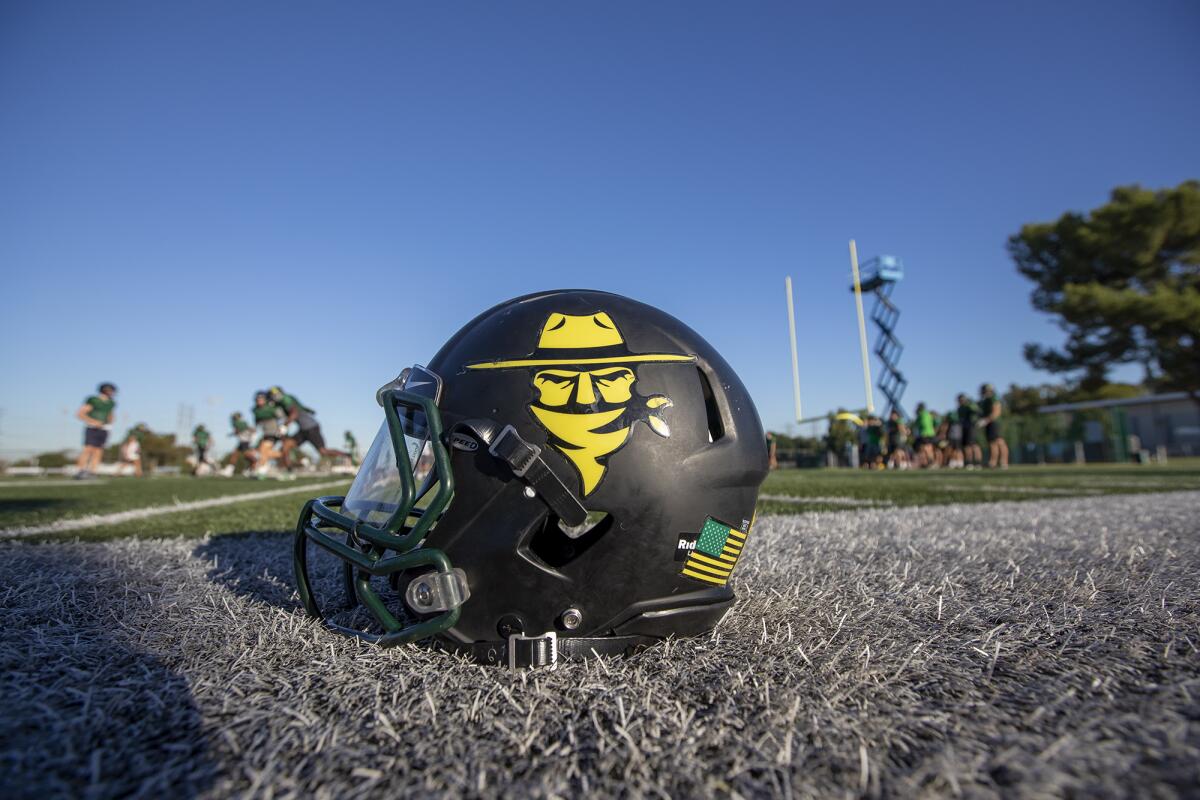 Golden West College football features the school's mascot Rustler Sam on the helmets.