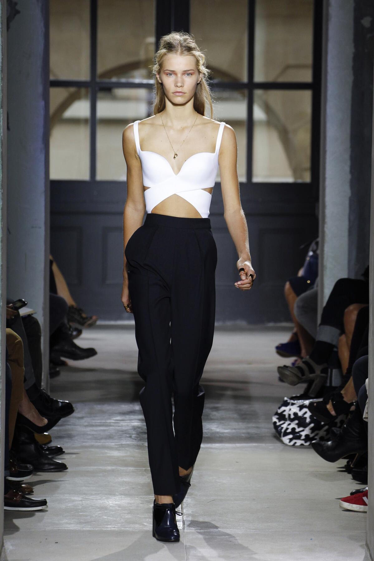 Looks from the Balenciaga spring-summer 2013 runway show during Paris Fashion Week.