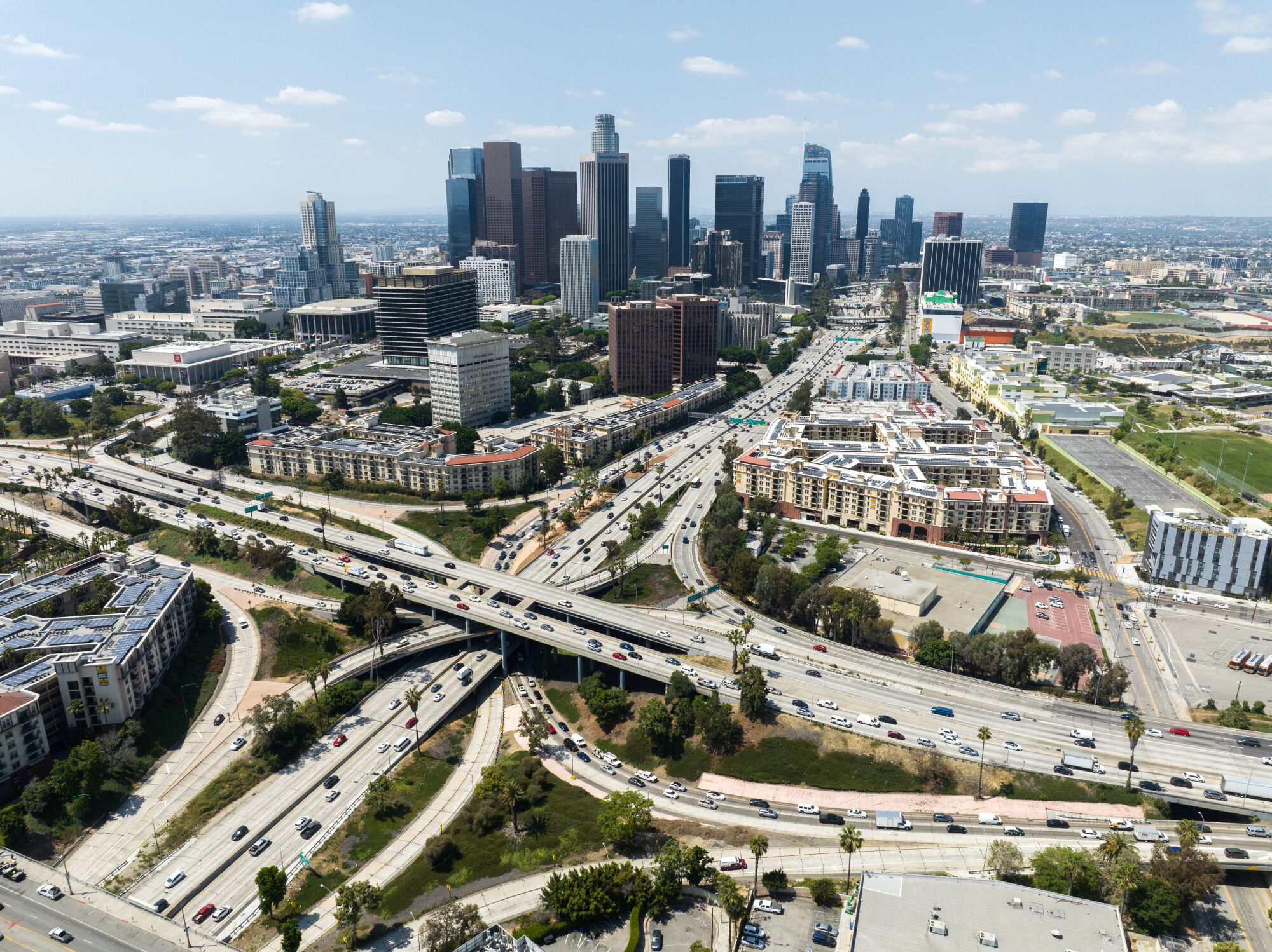 Los Angeles skyline and the four-level interchange where the 110 and 101 freeways meet.