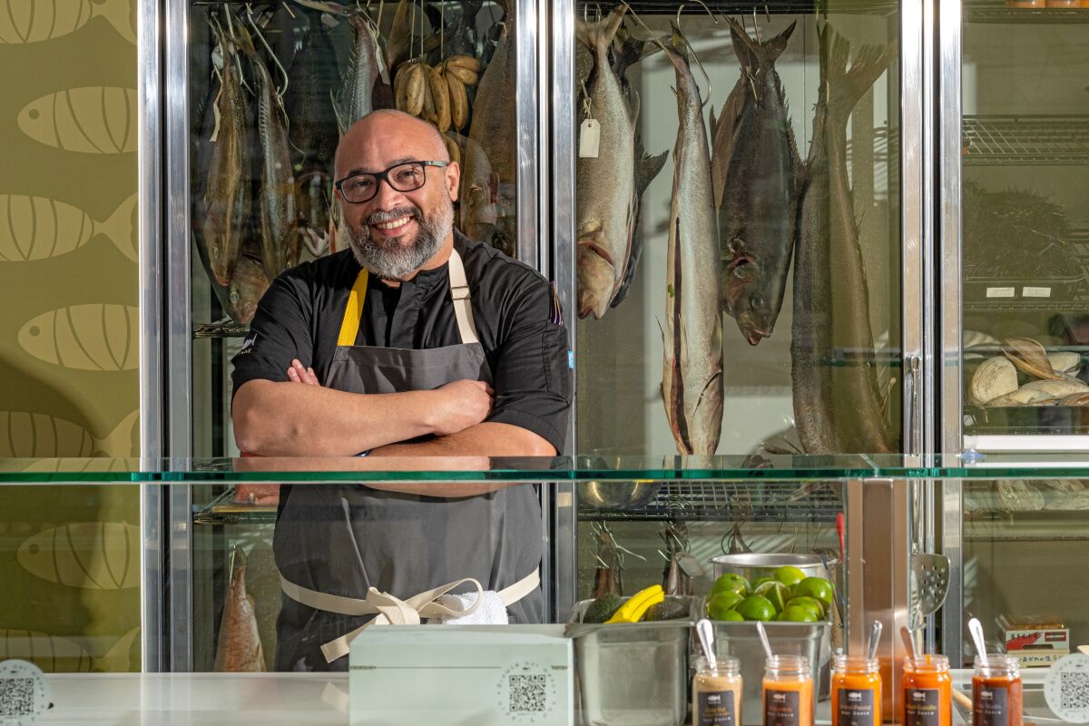 Chef Gilberto Cetina behind the counter at Holbox inside Mercado La Paloma.