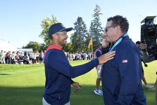 MONTREAL, QUEBEC - SEPTEMBER 29: Xander Schauffele of the U.S. Team hugs his father Stefan after the U.S. Team defeated the International Team during Singles Matches on day four of the 2024 Presidents Cup at The Royal Montreal Golf Club on September 29, 2024 in Montreal, Quebec. (Photo by Ben Jared/PGA TOUR via Getty Images)