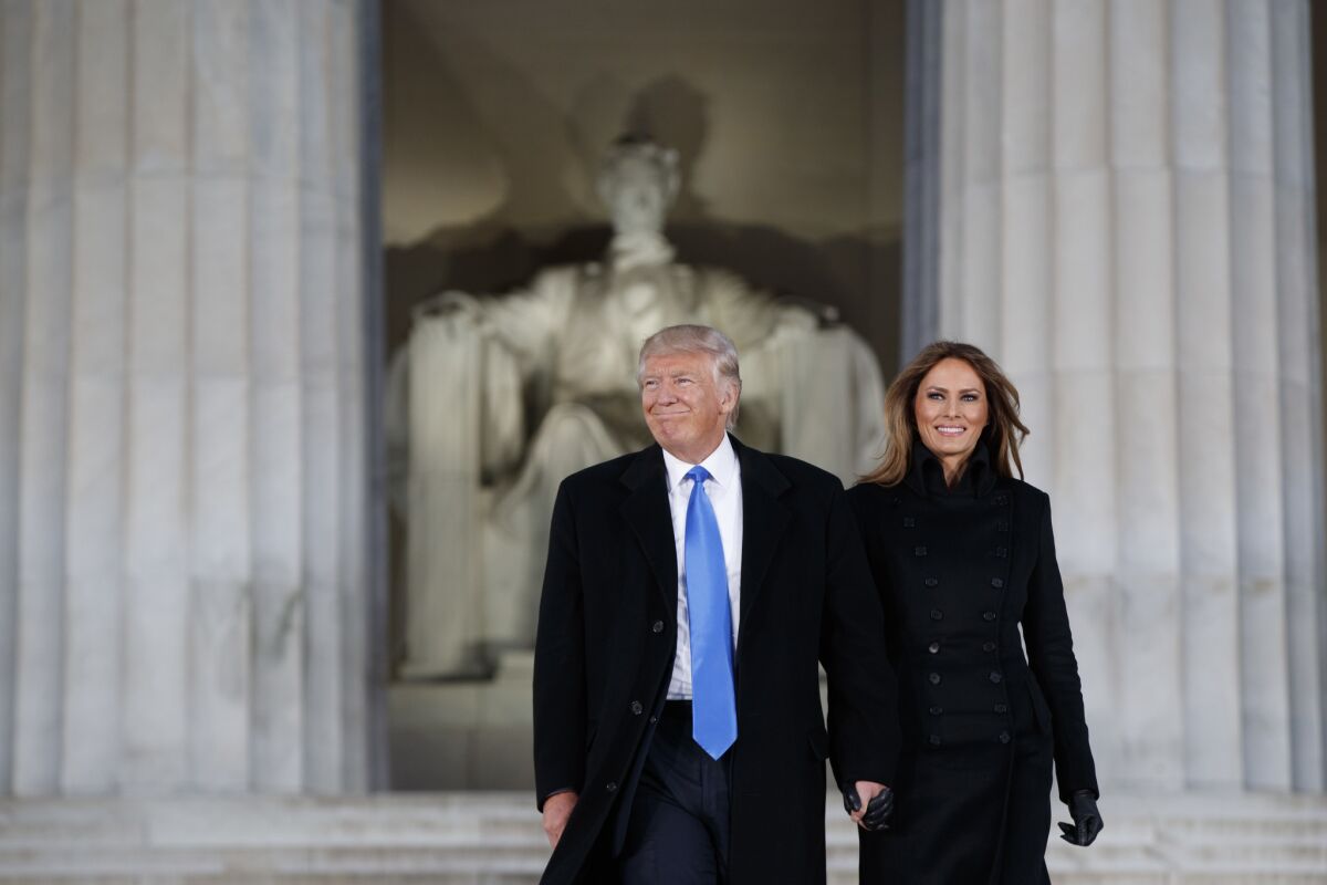 President-elect Donald Trump and his wife, Melania, as they arrived at Thursday's inaugural concert at the Lincoln Memorial.