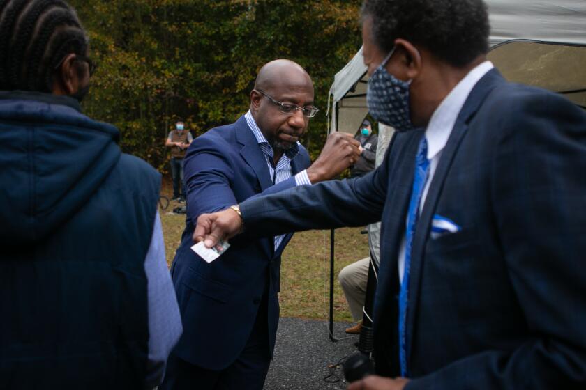 Rev. Ralph Huling of St James Missionary Baptist Church welcomes, senate candidate, Reverend Raphael Warnock.