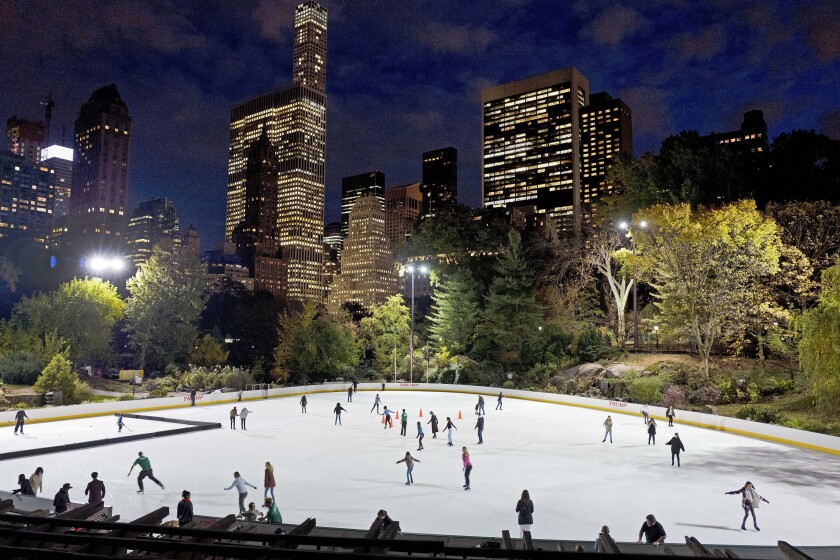 Ice skaters at Wollman Rink in Central Park