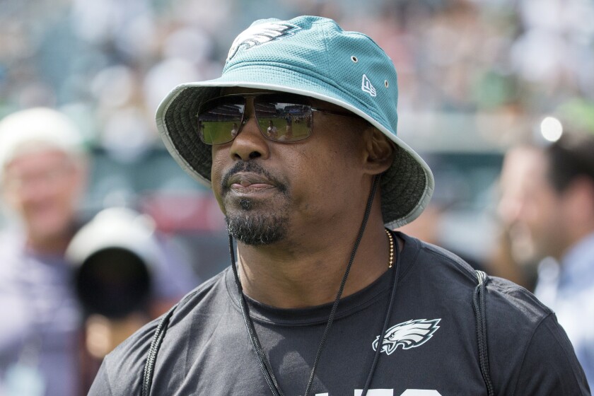 FILE - Brian Dawkins looks on as he recently joined the Philadelphia Eagles scouting department during practice at NFL football training camp, on July 31, 2016, in Philadelphia. Dawkins, a nine-time Pro Bowl safety and four-time All-Pro during 16 seasons with the Eagles and Broncos, has been on a mission to spread awareness about what he calls cerebral wellness since revealing a few years ago that he suffered from depression and had suicidal thoughts early in his playing career. (AP Photo/Chris Szagola, File)